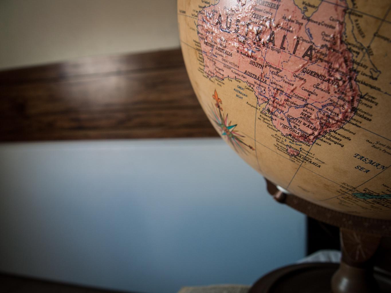 Australia shown on a globe.