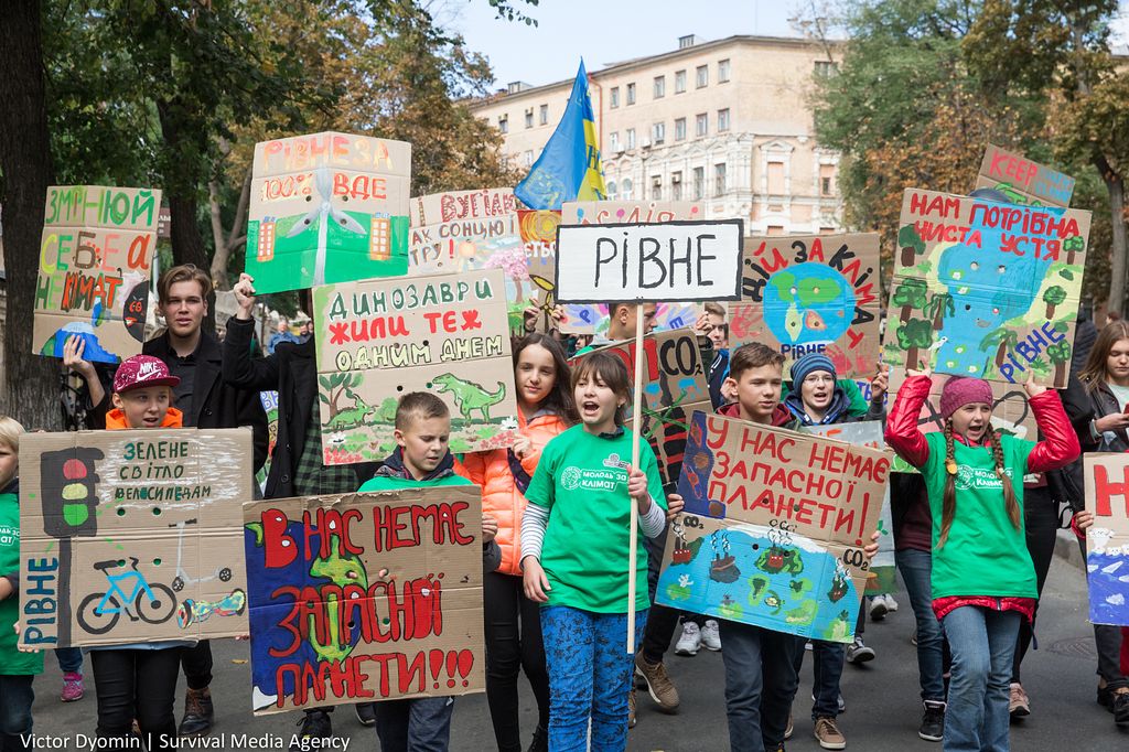 kids with posters chant slogans as climate protesters take action in Kiev, Ukraine on September 20, 2019.