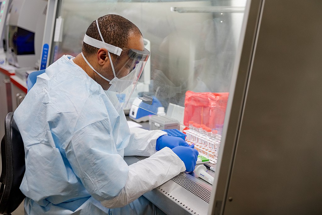 Pennsylvania Commonwealth microbiologist Kerry Pollard performs a manual extraction of the coronavirus inside the extraction lab at the Pennsylvania Department of Health Bureau of Laboratories on Friday, March 6, 2020.