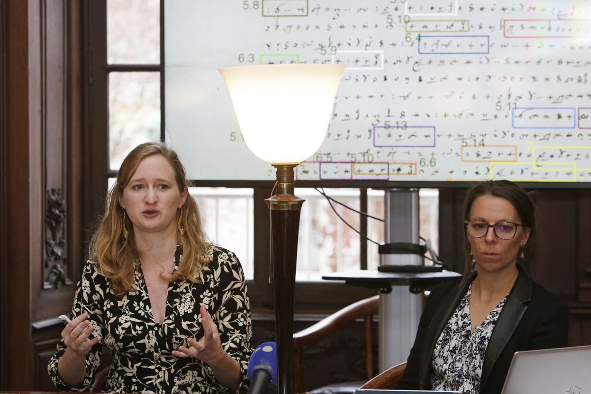 Cryptographer Cecile Pierrot (left) and historian Camille Desenclos talk to reporters about how they cracked the code in Charles V's letter.