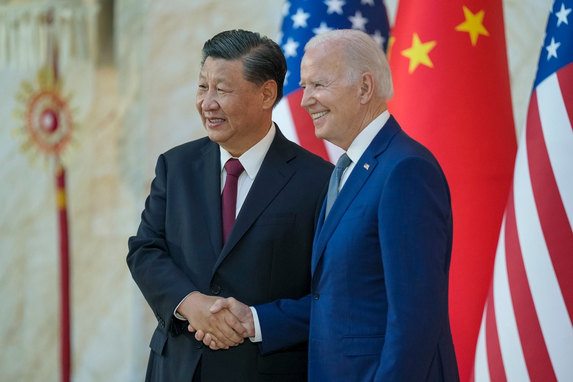 President Biden stands with President Xi Jinping of the PRC at the margins of the 2020 G-20 Bali Summit.