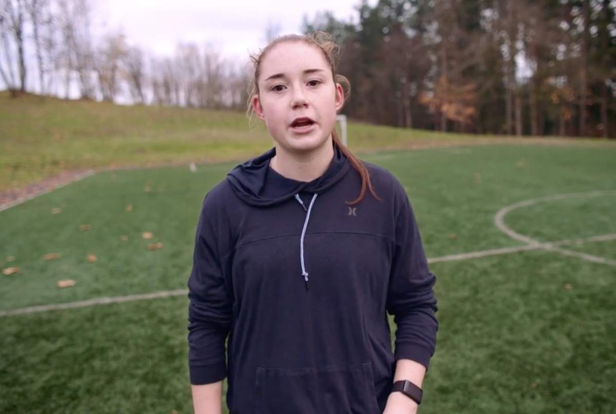 Olivia Moultrie on a soccer practice field.