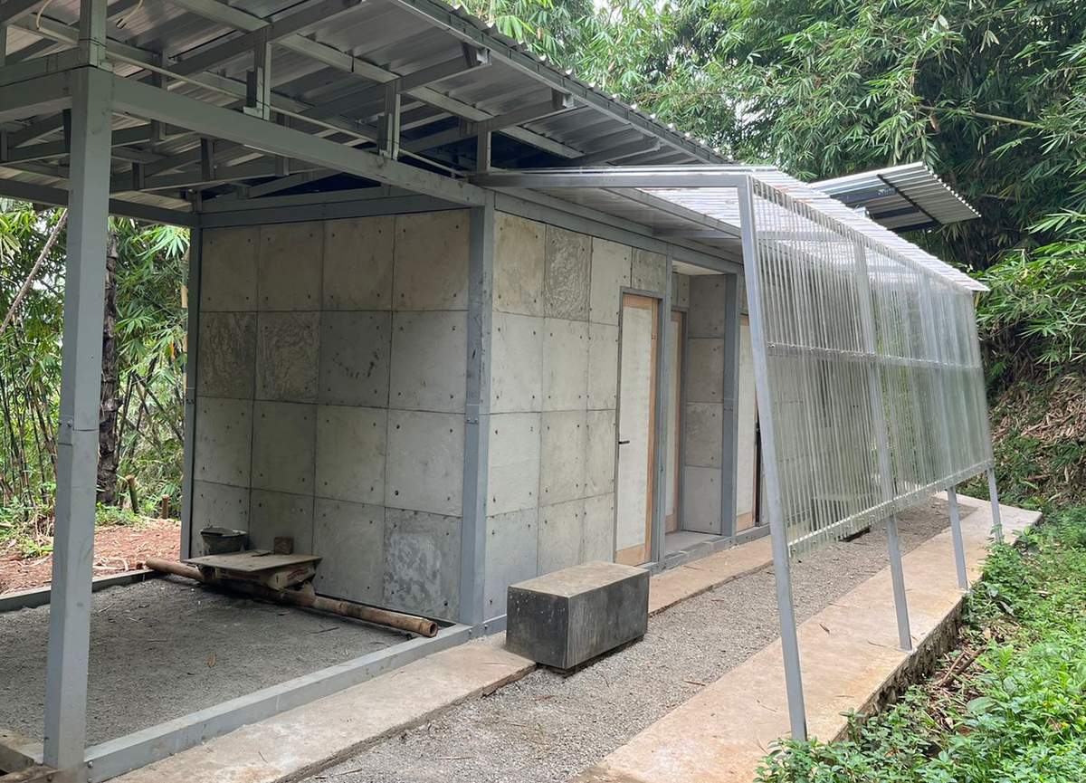 A view of the house built by the researchers out of concrete made with shredded diapers.