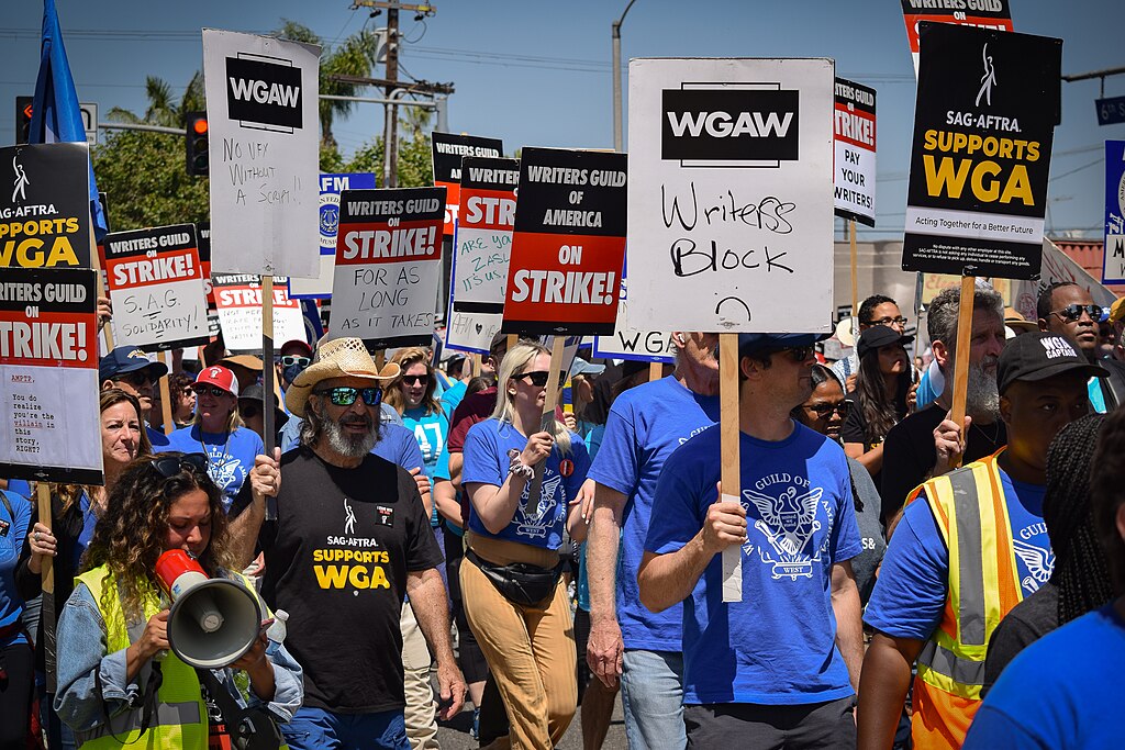 Picketers walking during a WGA Strike on June 21, 2023.