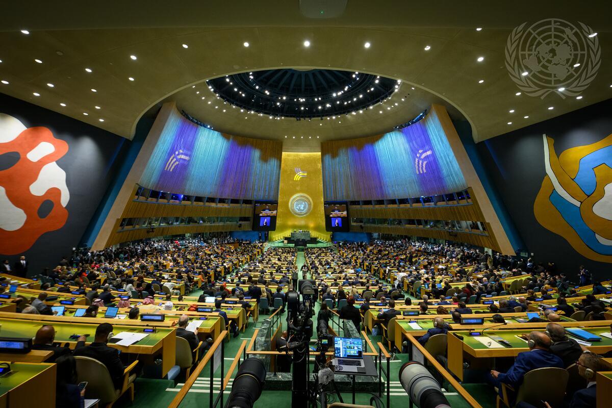 United Nations Summit of the Future meeting on Sunday. Hundreds of people seated in a massive colorful meeting hall.