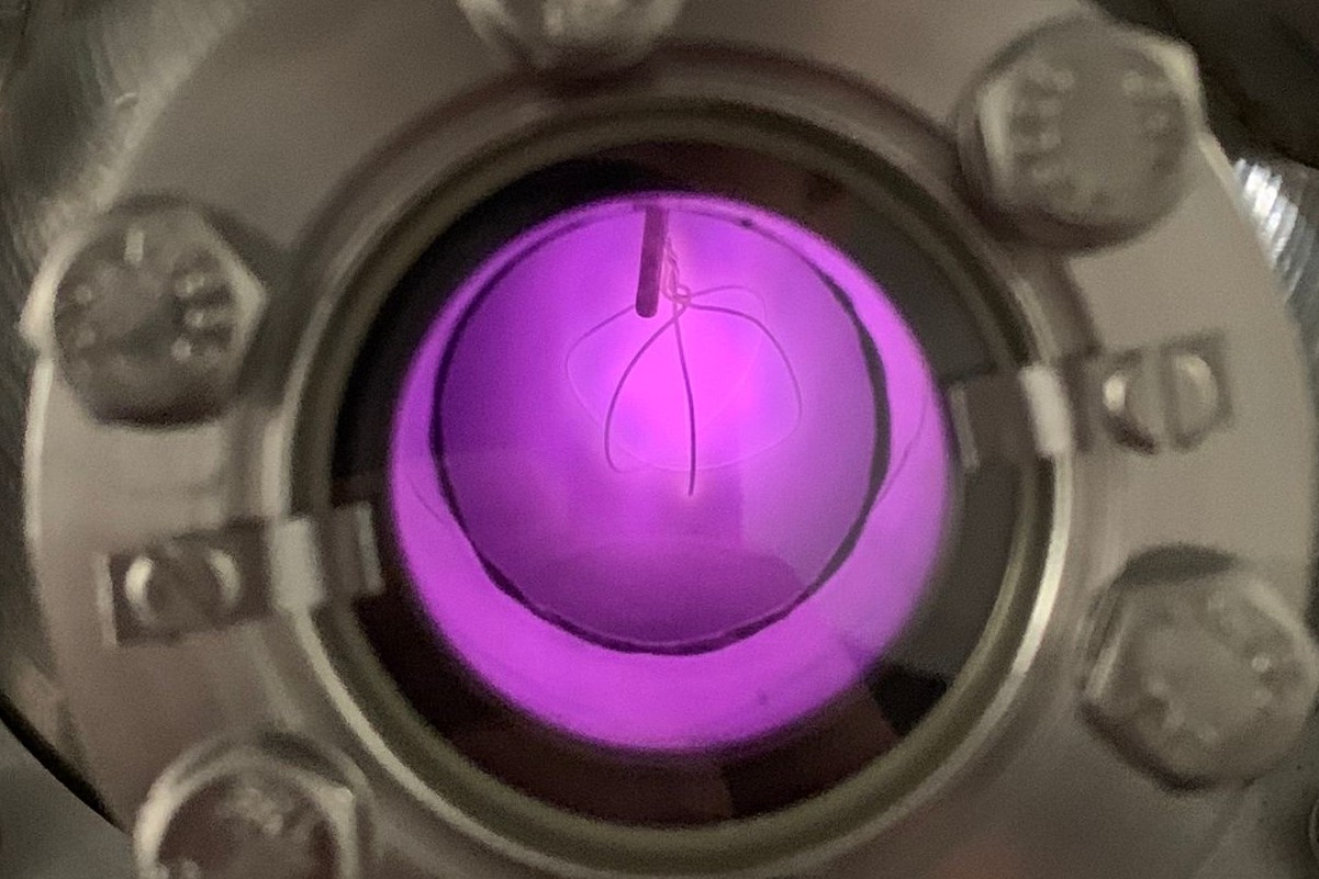 Plasma as seen through the view port on Cesare Mencarini's fusion reactor.