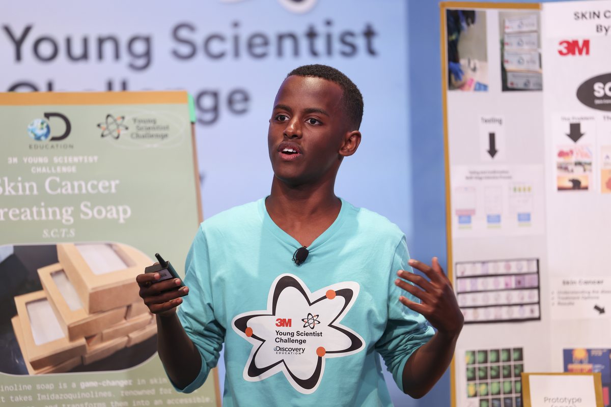 Heman Bekele discusses his soap at 3M Young Scientist Challenge.