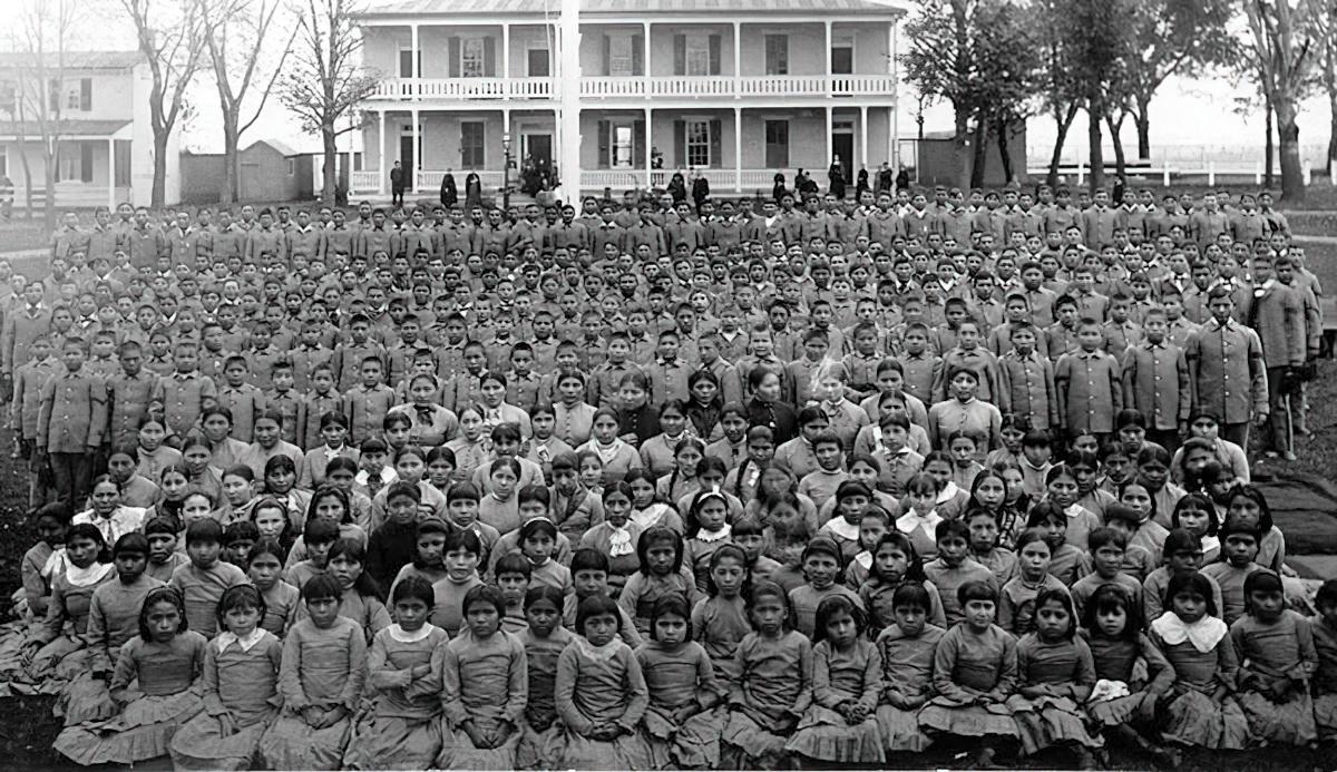 A picture of Native American students at Carlisle Indian Industrial School, in Pennsylvania taken around 1900.