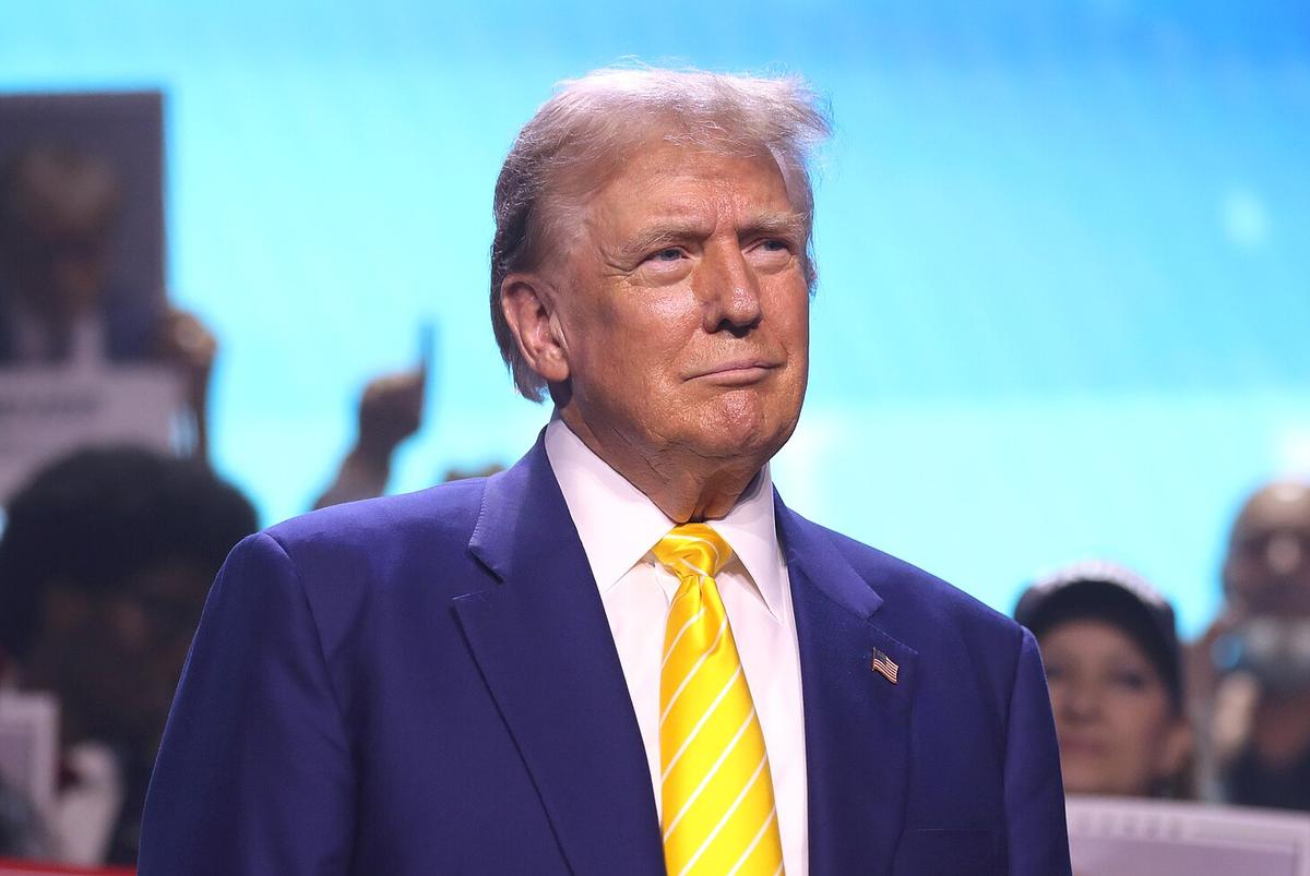 US Ex-President Donald Trump speaking in Phoenix, Arizona in June.